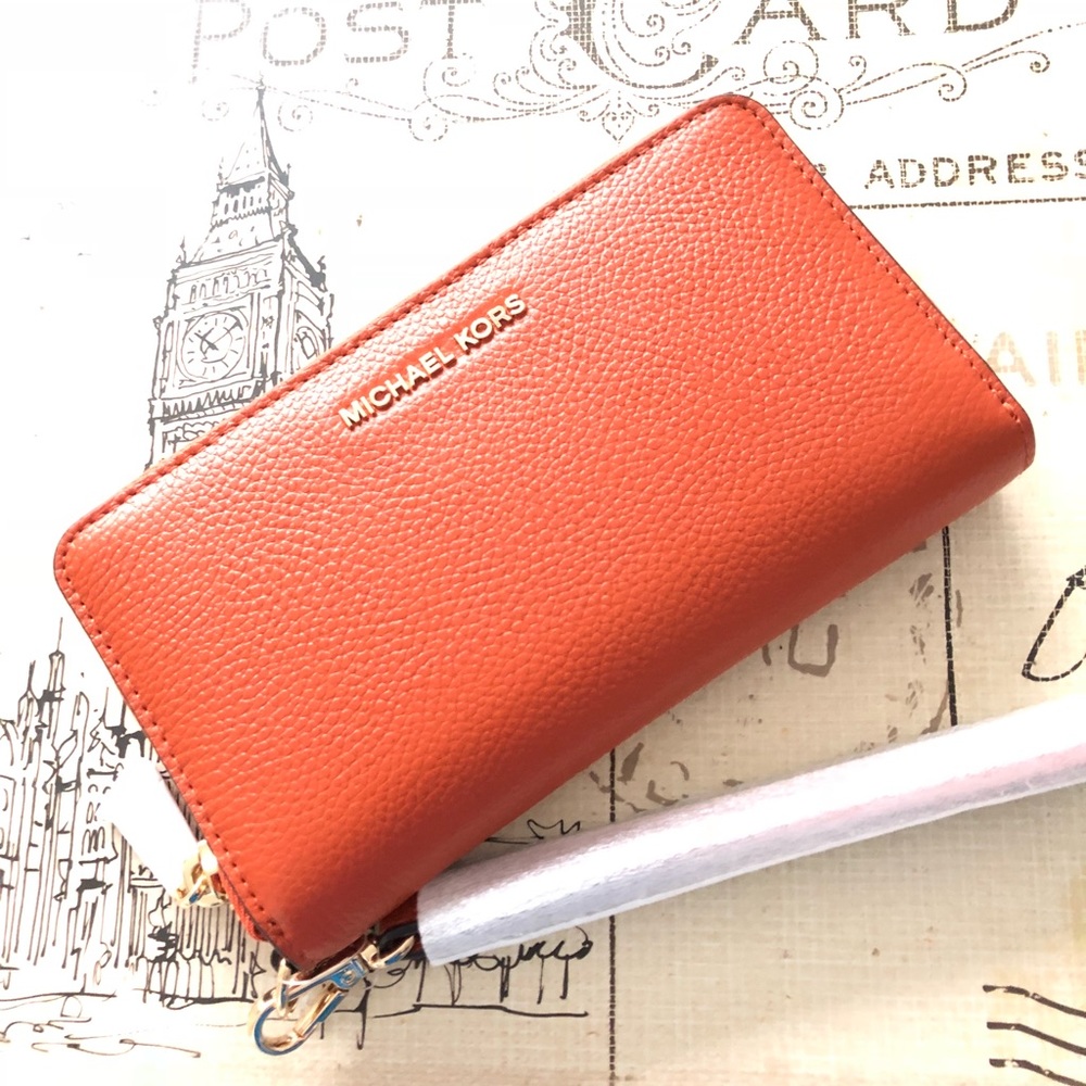 MK Mercer Lg Orange Leather Smartphone Wristlet